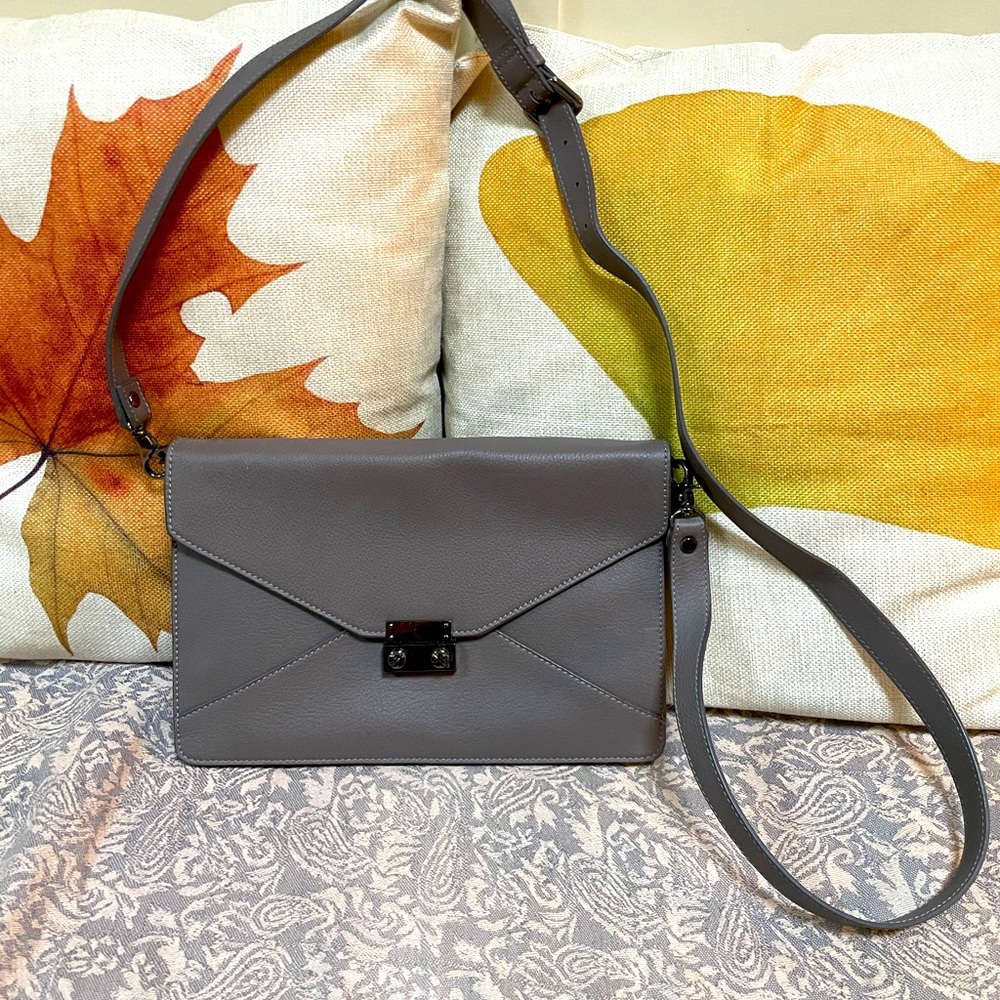 PURE Collection purse. Crossbody or strap can be removed to become a clutch.